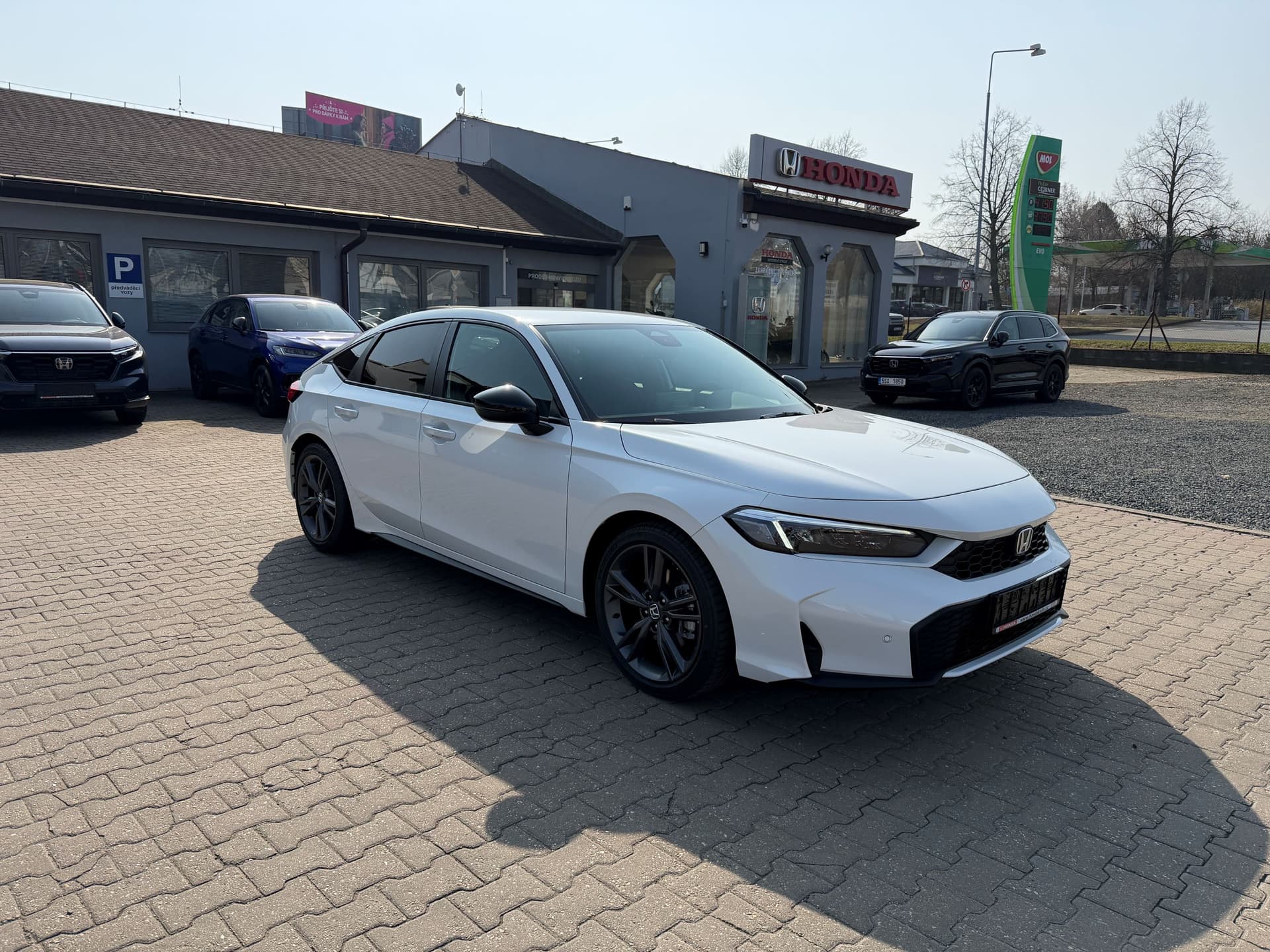 Honda Civic 2,0 Sport e:HEV - Fotografie 1